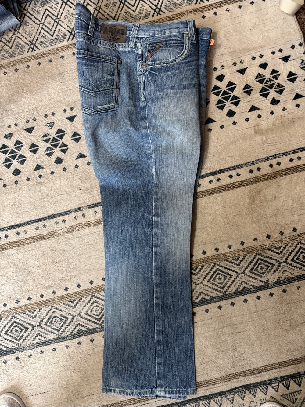 Ariat Men's Bootcut Jeans in Faded Blue Denim